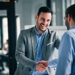 business etiquette means shaking hands to introduce yourself